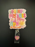 Badge reel with belt clip