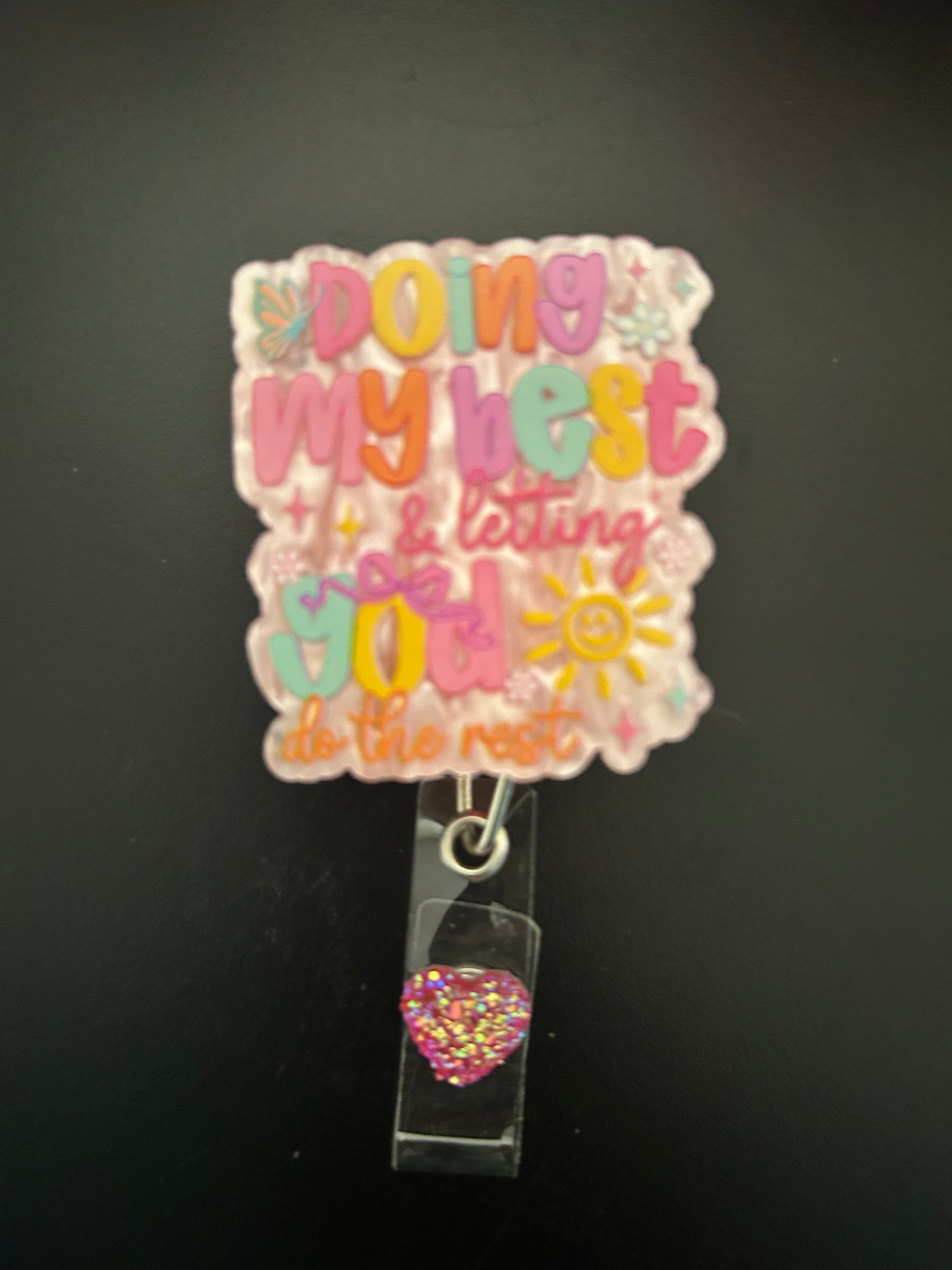 Badge reel with belt clip